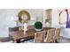 Dining room showcasing a decorative leaf wallpaper and statement mirror at 503 Meadow Ridge Dr, Belmont, NC 28012