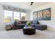 Comfortable living room with large windows, modern decor, and plush seating at 503 Meadow Ridge Dr, Belmont, NC 28012