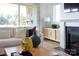 Bright living room with comfortable seating, fireplace, and seamless outdoor access at 503 Meadow Ridge Dr, Belmont, NC 28012