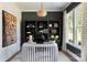 Modern home office featuring custom built-ins, striking decor, and natural light at 503 Meadow Ridge Dr, Belmont, NC 28012