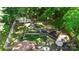 Expansive backyard boasting a garden area, patio, and mature trees, creating a private oasis at 7357 Elwood Dr, Charlotte, NC 28227