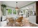 Eat-in kitchen with modern appliances, natural light, and seating for four at 7357 Elwood Dr, Charlotte, NC 28227