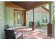 Charming front porch with seating and decorative elements, creating a welcoming entrance to the home at 7357 Elwood Dr, Charlotte, NC 28227