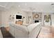 Spacious living room with vaulted ceiling, stone fireplace, and hardwood floors at 7357 Elwood Dr, Charlotte, NC 28227