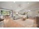Open living room features hardwood floors, recessed lighting, and plenty of space at 7357 Elwood Dr, Charlotte, NC 28227