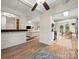 Open-concept living space showcasing a seamless flow between the kitchen, dining, and living areas at 7357 Elwood Dr, Charlotte, NC 28227
