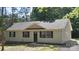 Charming single story home with black shutters and a well-maintained front yard at 7525 Cedarbrook Dr, Charlotte, NC 28215