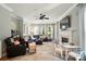A modern living room with a fireplace, sleek furniture, and an inviting atmosphere at 7722 Garnkirk Dr, Huntersville, NC 28078