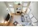 This is an aerial view of the cozy living room, showcasing a lovely fireplace and plush seating at 7722 Garnkirk Dr, Huntersville, NC 28078