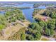 Breathtaking aerial view of the lake community with tree-lined streets, waterfront homes, and serene lake views at 7733 Skyline Dr, Sherrills Ford, NC 28673
