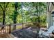 Spacious deck overlooking lush green scenery, perfect for enjoying the outdoors at 7733 Skyline Dr, Sherrills Ford, NC 28673