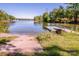 Picturesque lake view with a small dock and easy access to the water, perfect for enjoying outdoor activities at 7733 Skyline Dr, Sherrills Ford, NC 28673