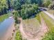 Aerial shot of waterfront land, showcasing a large cleared lot, ready for building, with easy lake access at 7733 Skyline Dr, Sherrills Ford, NC 28673