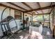 Charming covered porch with swing chair and comfortable seating area at 7733 Skyline Dr, Sherrills Ford, NC 28673