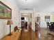 Hallway with views of the living room, dining room and kitchen, shows the house layout at 8128 Sealey Ct, Charlotte, NC 28277