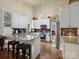 Well-appointed kitchen with granite countertops, stainless steel appliances, and lots of natural light at 8128 Sealey Ct, Charlotte, NC 28277