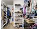 Spacious walk-in closet with ample shelving and hanging space for organized storage at 8128 Sealey Ct, Charlotte, NC 28277