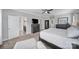 Spacious Primary bedroom with a sitting area, television, and access to an ensuite bathroom at 8702 Aspinwall Dr, Charlotte, NC 28216