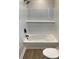 Clean bathroom featuring a shower-tub combo with white subway tile surround at 913 Winchester Ave, Monroe, NC 28110