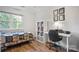 Bedroom features a large window, desk, and bookshelf; blends comfort and function at 9214 Arbourgate Meadows Ln, Charlotte, NC 28277