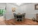 Bright dining area featuring hardwood floors and ample space for entertaining at 9214 Arbourgate Meadows Ln, Charlotte, NC 28277