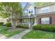 Charming blue townhome with a well-maintained front yard and inviting porch at 9214 Arbourgate Meadows Ln, Charlotte, NC 28277