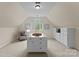 Large custom closet with a vaulted ceiling, dressing area and ample storage space at 1021 Westbury Dr, Matthews, NC 28104