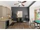 Entertaining space featuring dark accent wall, and a wet bar at 1021 Westbury Dr, Matthews, NC 28104
