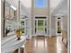 Elegant foyer with hardwood floors, white trim, and ample natural light at 1021 Westbury Dr, Matthews, NC 28104