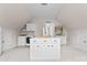 Spacious laundry room featuring white cabinetry, laundry units, and ample storage space at 1021 Westbury Dr, Matthews, NC 28104