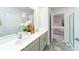 Bright bathroom featuring a double vanity with white countertops and grey cabinets at 1033 20Th Avenue Se Loop, Hickory, NC 28602