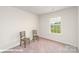 Bright, cozy bedroom with plush carpeting and a large window at 1033 20Th Avenue Se Loop, Hickory, NC 28602