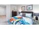 Fun bedroom featuring a bed with dinosaur themed bedding and two dino themed art pieces at 1033 20Th Avenue Se Loop, Hickory, NC 28602