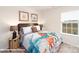 Bedroom featuring a bed with dinosaur themed bedding and two dino themed art pieces at 1033 20Th Avenue Se Loop, Hickory, NC 28602