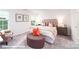 Bright bedroom boasts natural light, neutral tones and stylish decor at 1033 20Th Avenue Se Loop, Hickory, NC 28602