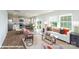 Open-concept living space features modern decor, hardwood floors and a kitchen area at 1033 20Th Avenue Se Loop, Hickory, NC 28602