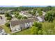 Picturesque townhome community with mature trees, a pool, and well-maintained lawns at 104 Clydesdale Ct, Matthews, NC 28104