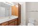 Bathroom with a vanity, mirror, toilet and a shower over tub at 104 Clydesdale Ct, Matthews, NC 28104