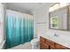 Bathroom featuring a shower with a curtain, a toilet, and a vanity at 104 Clydesdale Ct, Matthews, NC 28104