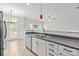 Bright kitchen features stainless steel appliances, double sink, and access to the breakfast area at 104 Clydesdale Ct, Matthews, NC 28104