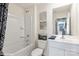 Clean bathroom with white fixtures, tub-shower combo, and neutral wall decor at 1045 20Th Avenue Se Loop, Hickory, NC 28602