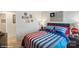 Fun bedroom with striped bedding, road signs decorations, and dark wood furniture at 1045 20Th Avenue Se Loop, Hickory, NC 28602