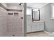 Modern bathroom featuring a sleek shower and vanity with ample storage space at 105 Strickland Ln, Bessemer City, NC 28016