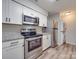 Modern kitchen featuring stainless steel appliances, granite countertops, and ample cabinet space at 1052 Churchill Downs Ct # I, Charlotte, NC 28211