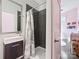 This is a contemporary bathroom featuring a floating vanity and modern shower with a subway tile surround at 1054 Kenilworth Ave, Charlotte, NC 28204