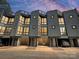 Contemporary townhome exterior with private driveways and modern architectural design at 1054 Kenilworth Ave, Charlotte, NC 28204