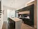 Stylish kitchen with a large island, modern appliances, and elegant pendant lighting at 1054 Kenilworth Ave, Charlotte, NC 28204