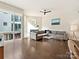 Bright living room with large windows and a comfortable gray sectional sofa at 1054 Kenilworth Ave, Charlotte, NC 28204