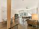 Spacious living room featuring an open floor plan, hardwood floors, and ample natural light at 1054 Kenilworth Ave, Charlotte, NC 28204