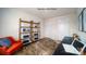 Bright office space with a modern desk, clear chairs, and a vibrant orange accent chair at 1064 20Th Avenue Se Loop, Hickory, NC 28602
